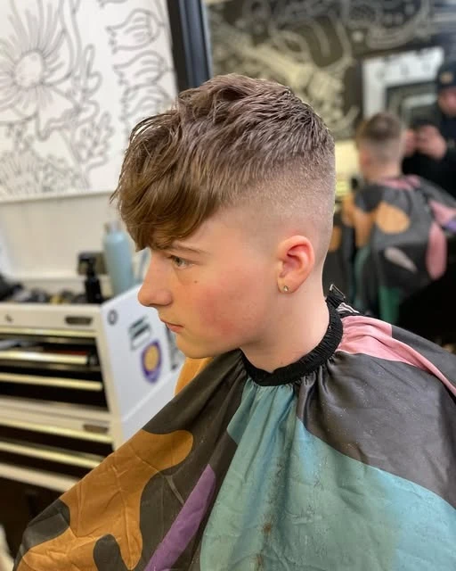 Long textured fringe with closely faded sides